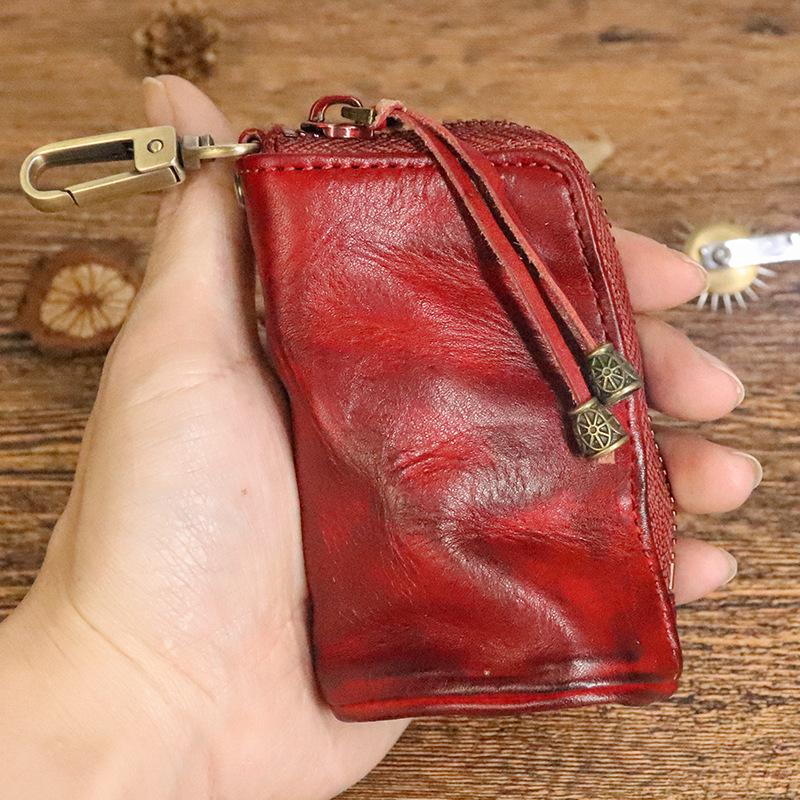 Men's Retro Genuine Leather Waist Key Holder: Large Capacity Cowhide Bucket Bag with Multifunctional Zipper Pouch.