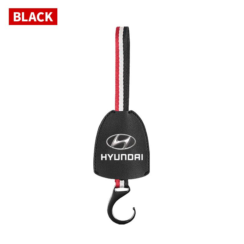 1Pcs PU Leather Car Seat Back Hooks Accessories For Hyundai I10 Elantra Getz Sonata XG Terracan Coupe Trajet Matrix Emblem AH4