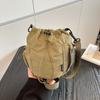 Japanese ins style niche design sense drawstring bucket outdoor sports leisure fashion versatile nylon messenger bag