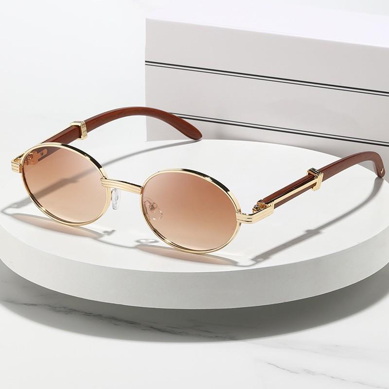 Fashion European and American sunglasses new women's oval frame metal glasses advanced sense Internet celebrity sunshades