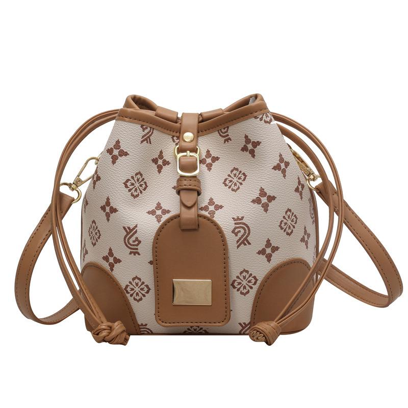 

Ретро Геометрический Цветочный Девочка Сумка через плечо Мода Повседневная Женская Сумка кроссбоди Новая Сумка-ведро на кулиске Девочка ПВХ Материал Металл