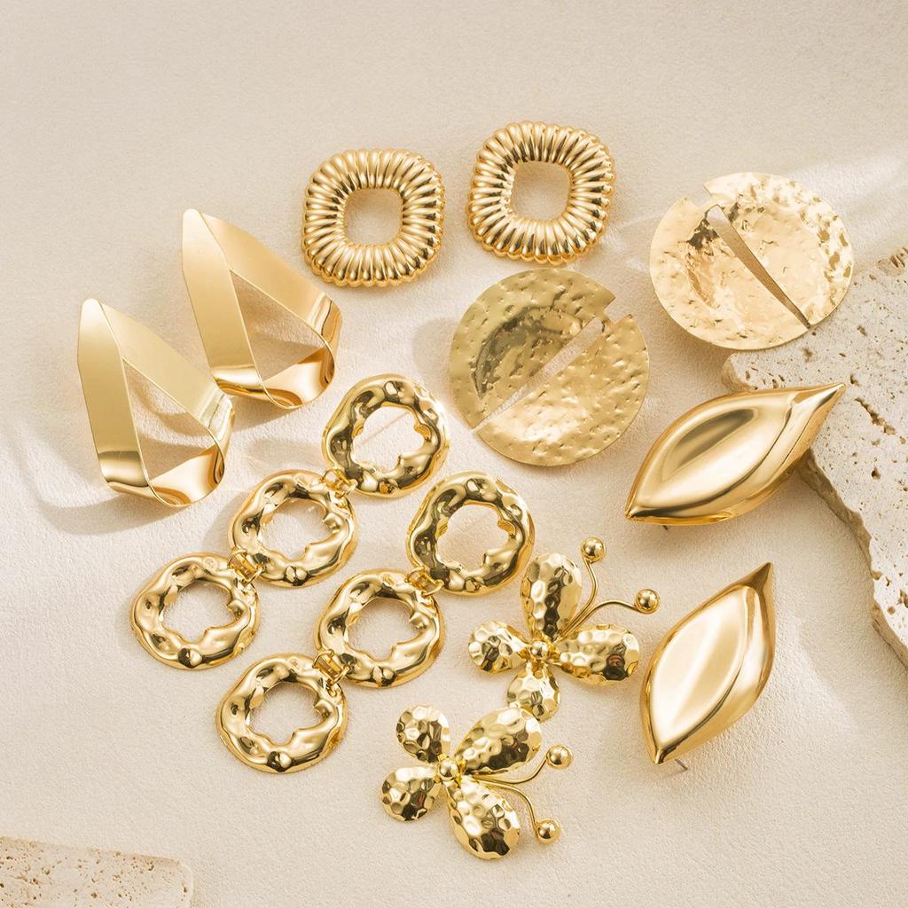 Geometric Irregular Butterfly Metallic Stud Earrings with Retro Hollow Design