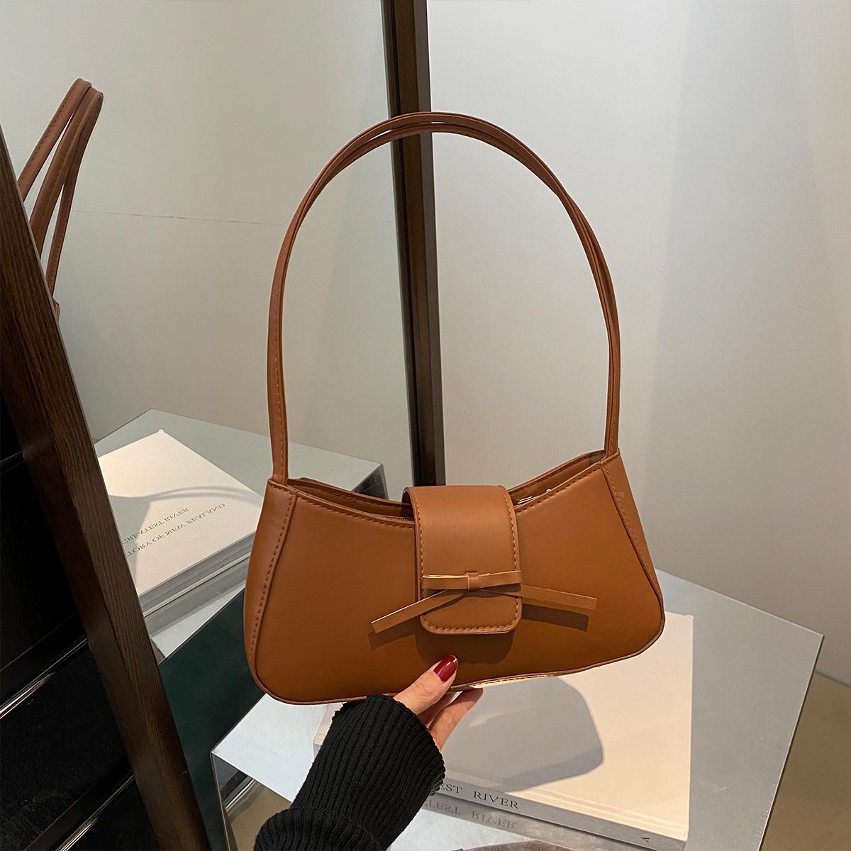 

Милая однотонная сумка через плечо для женщин с бантом и магнитным клапаном. Идеально подходит для повседневного использования на работу и обратно.