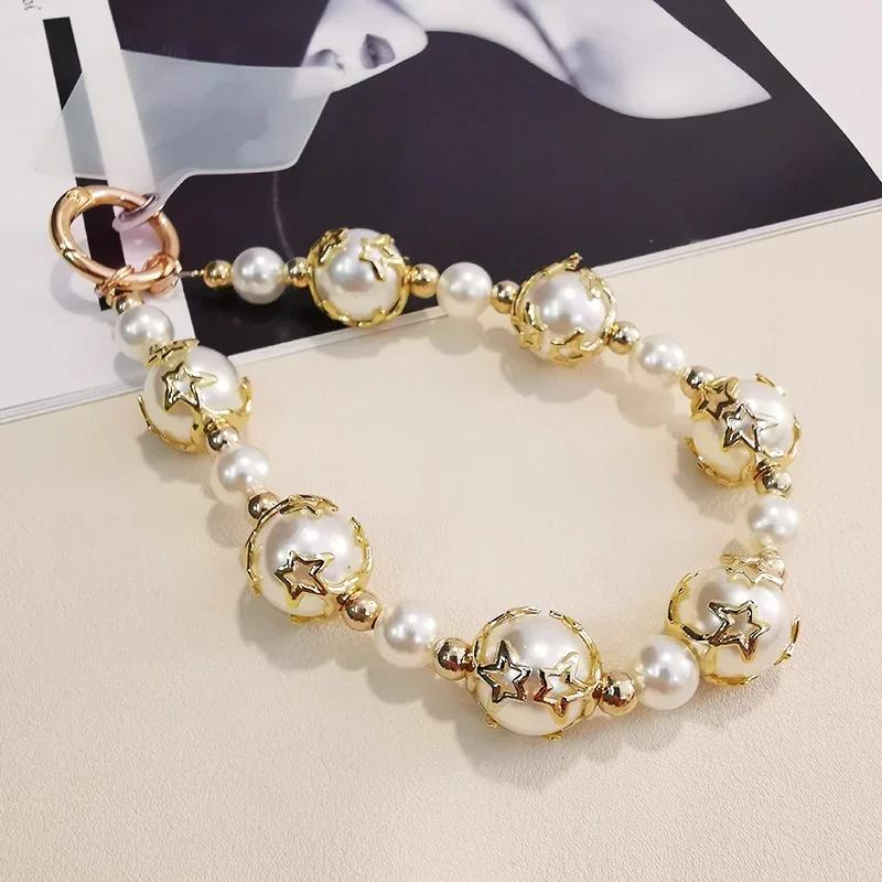

Mobile Phone Lanyard Pentagonal Star Pearl Chain Wrist Pendant Hollow Exquisite Pendant Universal Mobile Phone Case PendantCharm