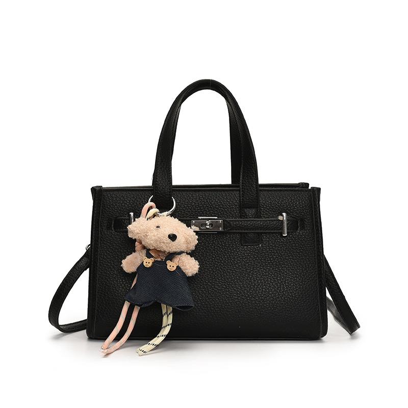 Niche portable small square bag women's new fashion versatile simple shoulder bag casual commuter messenger bag