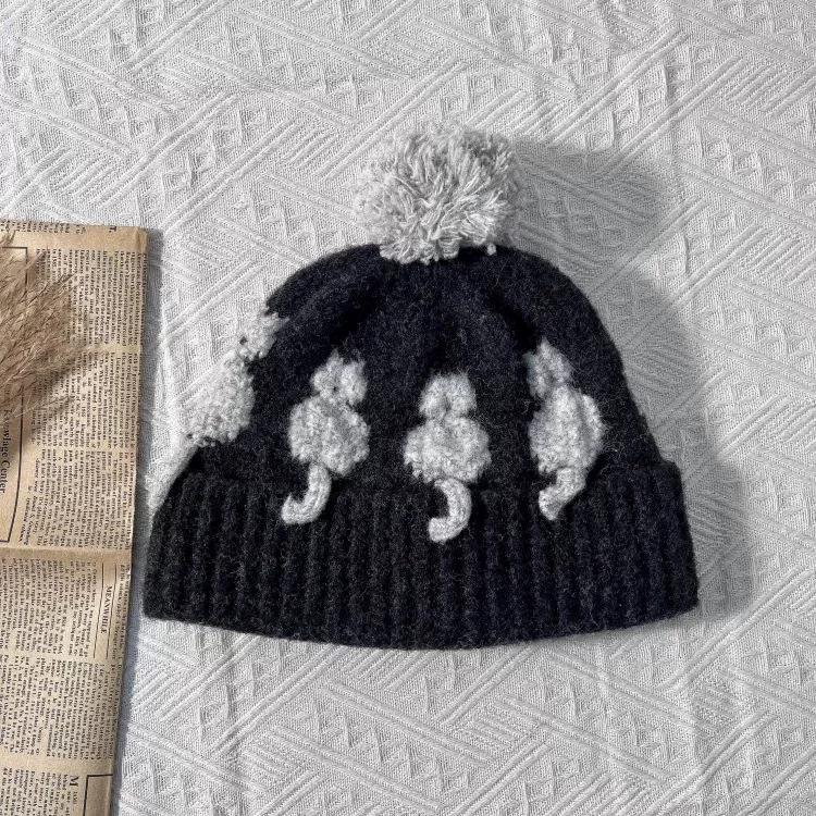 Cute three-dimensional cat jacquard wool hat female winter warm cold ear protection windproof color matching hairball knitted cold hat