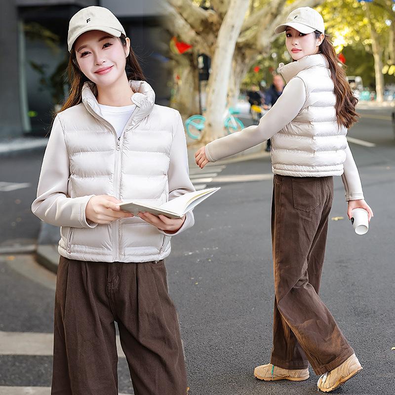 Autumn and winter light stand-up neck cotton-padded clothes women's splicing sleeves solid color short jacket women's clothing can be mixed in batches