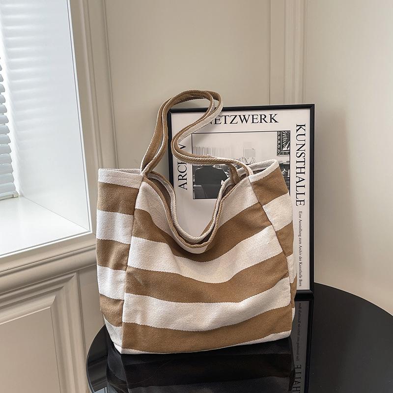 

Дорожная сумка холщовая сумка офисный работник通勤 женщины большая вместимость корейская версия полосатая модная сумка через плечо холщовая сумка для покупок хаки