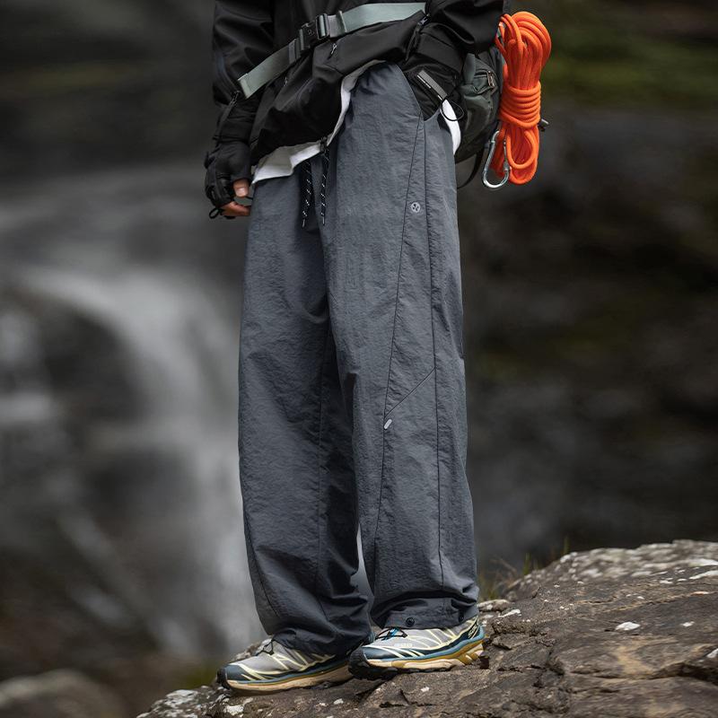 Outdoor tooling casual pants men's new anti-splashing split design long pants four-in-one buckle adjustment charging pants