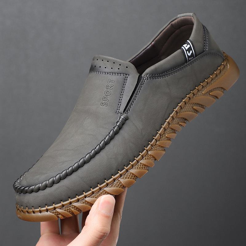 

2025 весна и лето новые повседневные туфли мужские кожаные туфли для вождения одинарные туфли с покрытием для стопы резиновая мягкая подошва мужские одинарные 161 44 серый