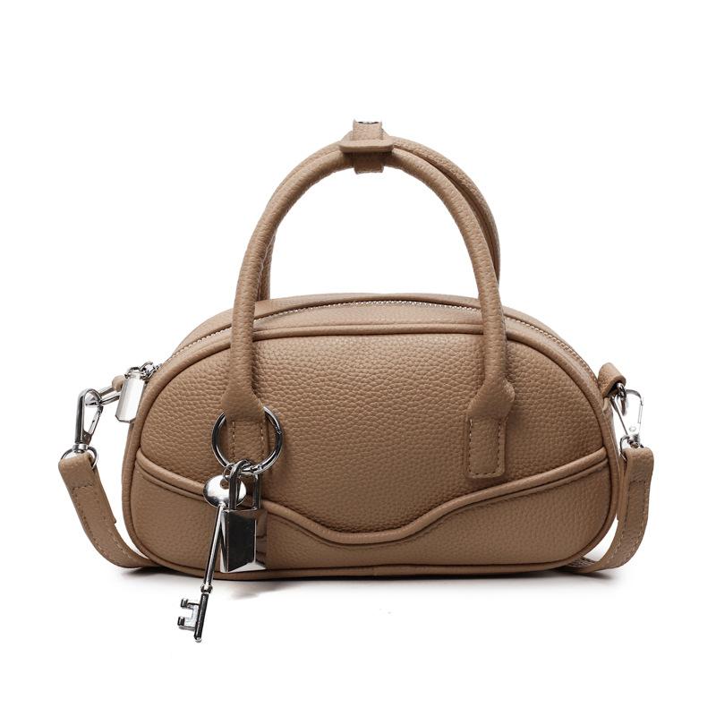 New textured portable bowling bag women's 2025 spring fashion simple shoulder messenger bag popular small square bag