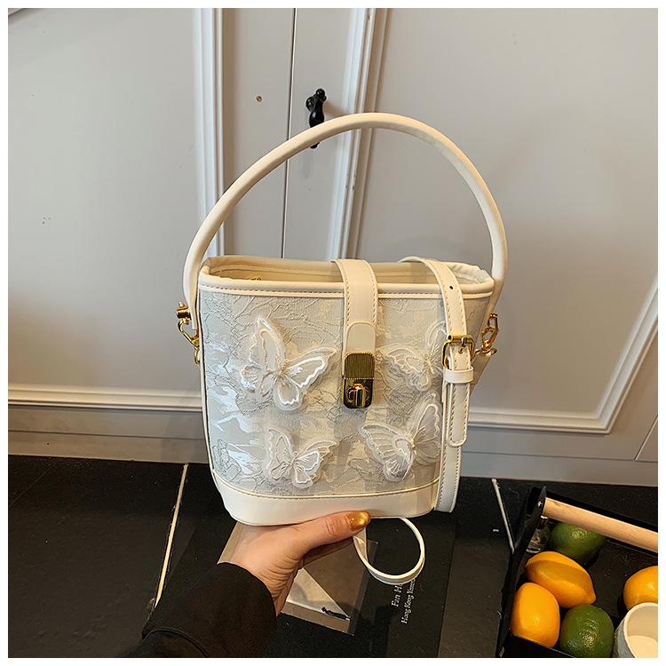 New small bag women 2025 fashion cartoon portable bucket bag versatile texture messenger bag