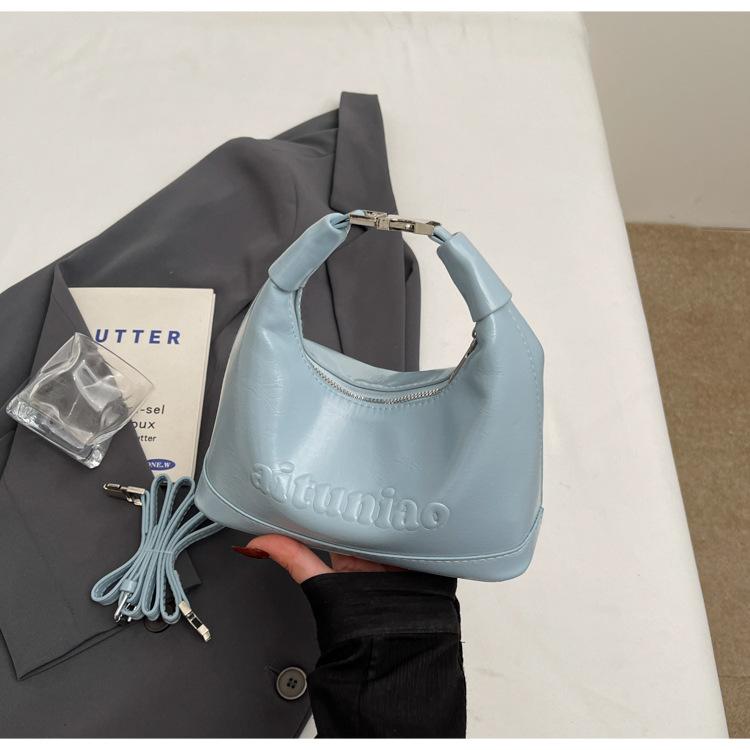 

Новая весенняя нишевая дизайнерская сумка высокого класса, модная и простая женская сумка-полумесяц под мышкой