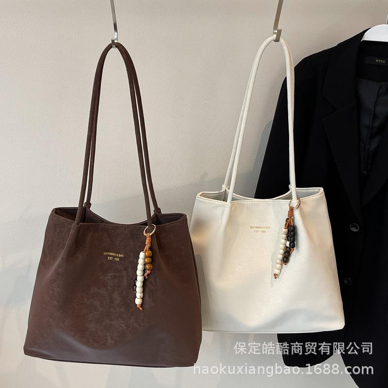 Large-capacity bag women's autumn and winter versatile 2025 new retro texture shoulder bag casual work commuter tote bag