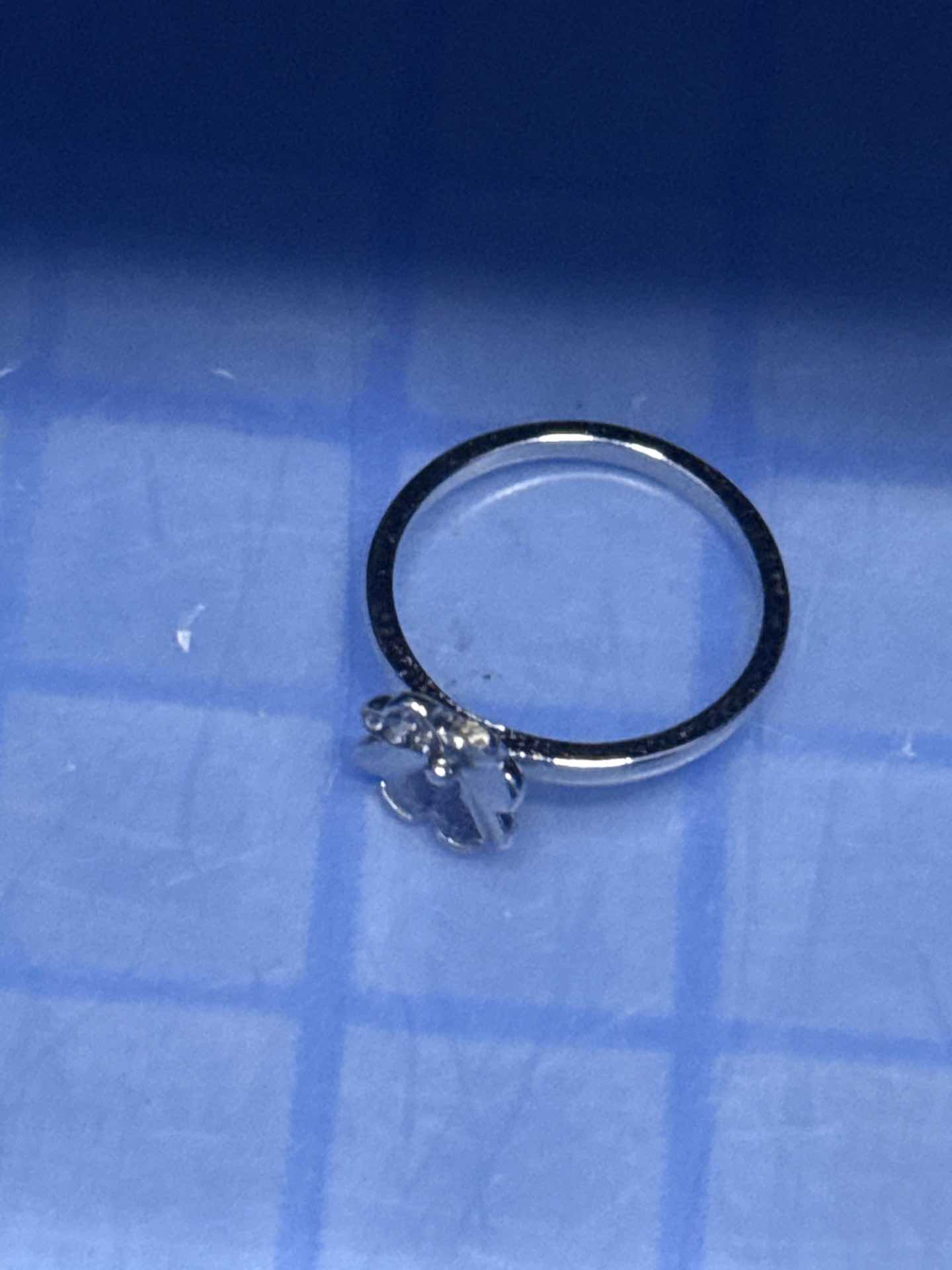 

Four Leaf Clover Ring with Sparkling Cubic Zirconia Adjustable Band Elegant Design Durable Material Suitable for Daily Wear and Special Occasions One Size