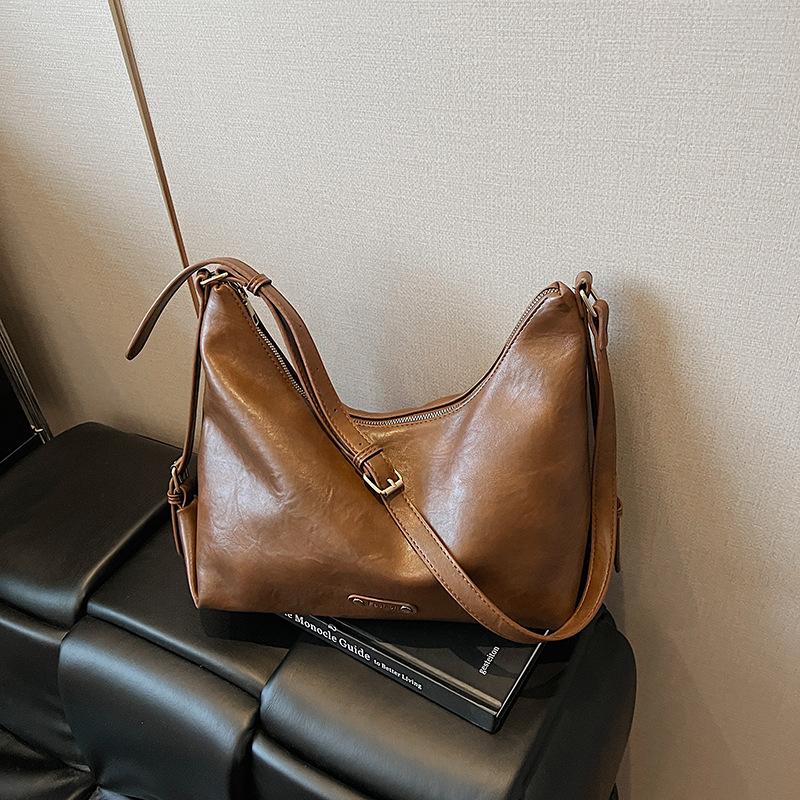 Premium sense retro large-capacity bag women's 2025 new fashion commuter shoulder messenger bag tote bag bucket bag