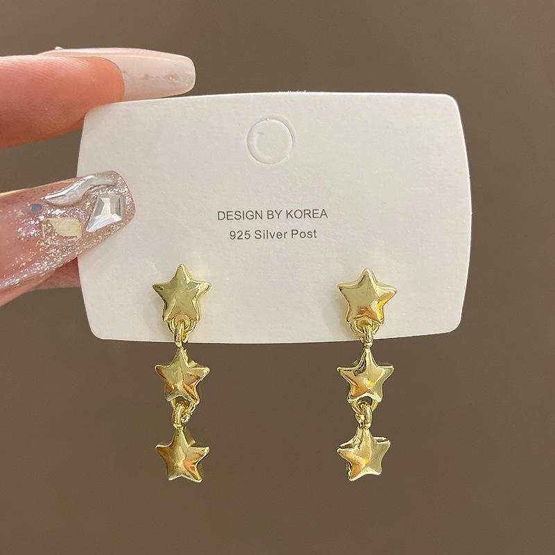 

Cold wind metal star fringed earrings women s versatile niche temperament long stud earrings Korean high-end ear jewelry