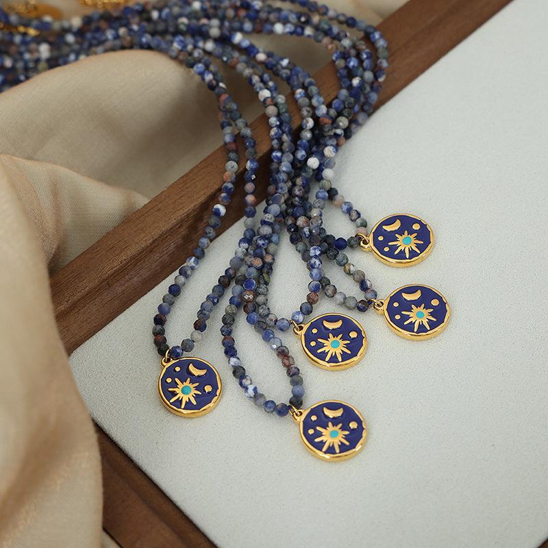 European-American Niche: Blue Spirit Grey Natural Stone Handmade Necklace with Starry Sky Glaze Angel Pendant in Gold-Plated Titanium Steel.