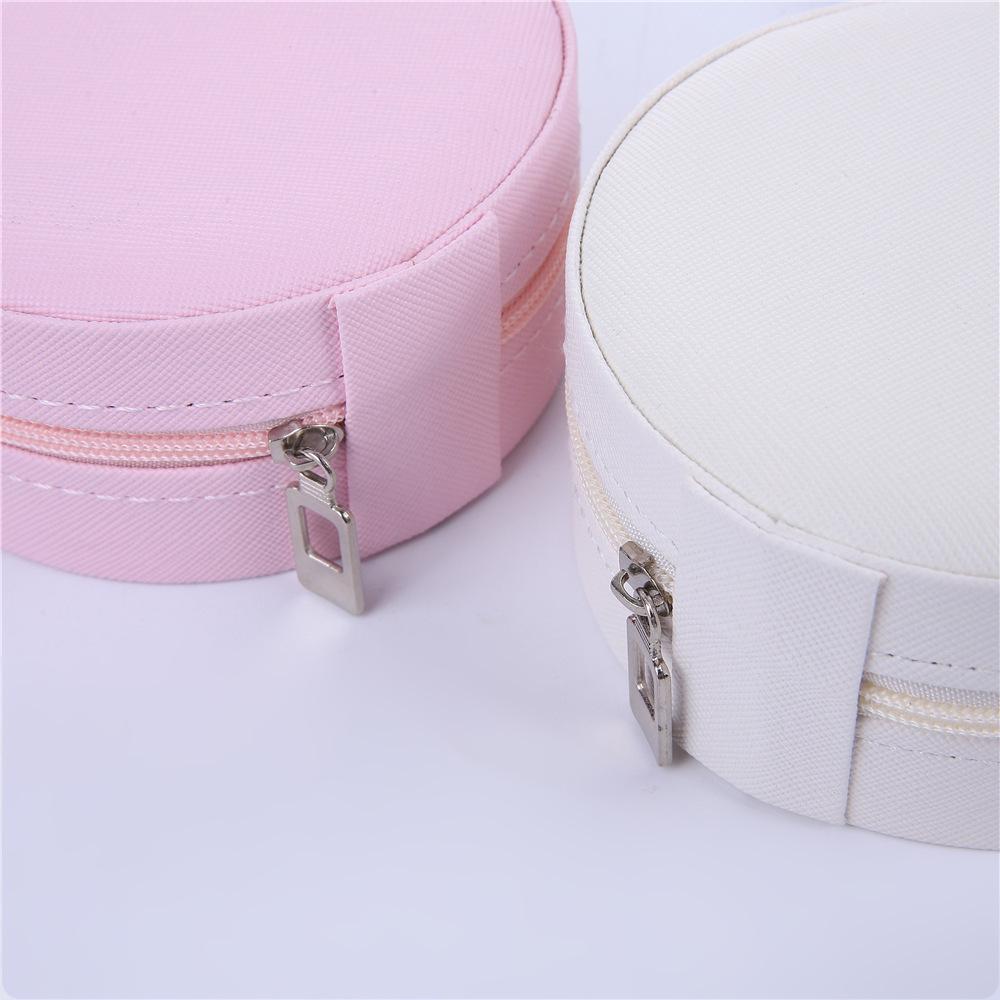 Compact Round Travel Jewelry Box for Earrings, Rings, and Necklaces