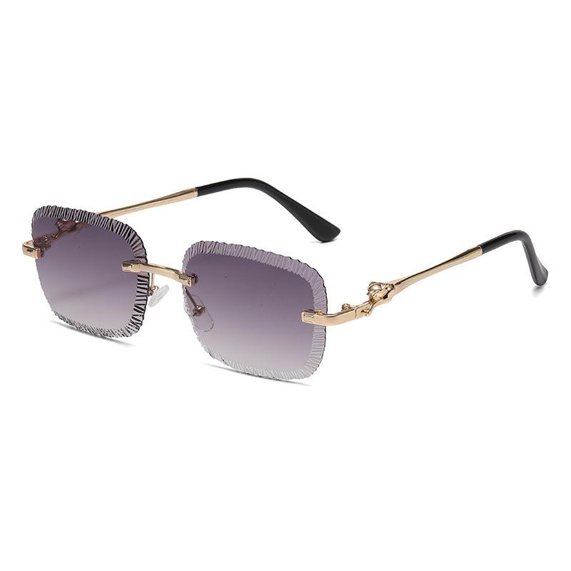 European and American fashion new card home serrated frameless sunglasses European and American ins fashion leopard head metal sunglasses