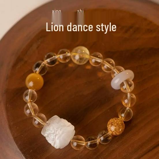 

Женский браслет с цитрином и бусинами из желтого рутилового кварца - Дизайн «Танец льва», символ удачи, подарок.