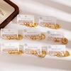 18K Gold Plated Cross Stainless Steel Earrings for Women: Fashionable Non-fading Studs with Unique Design.