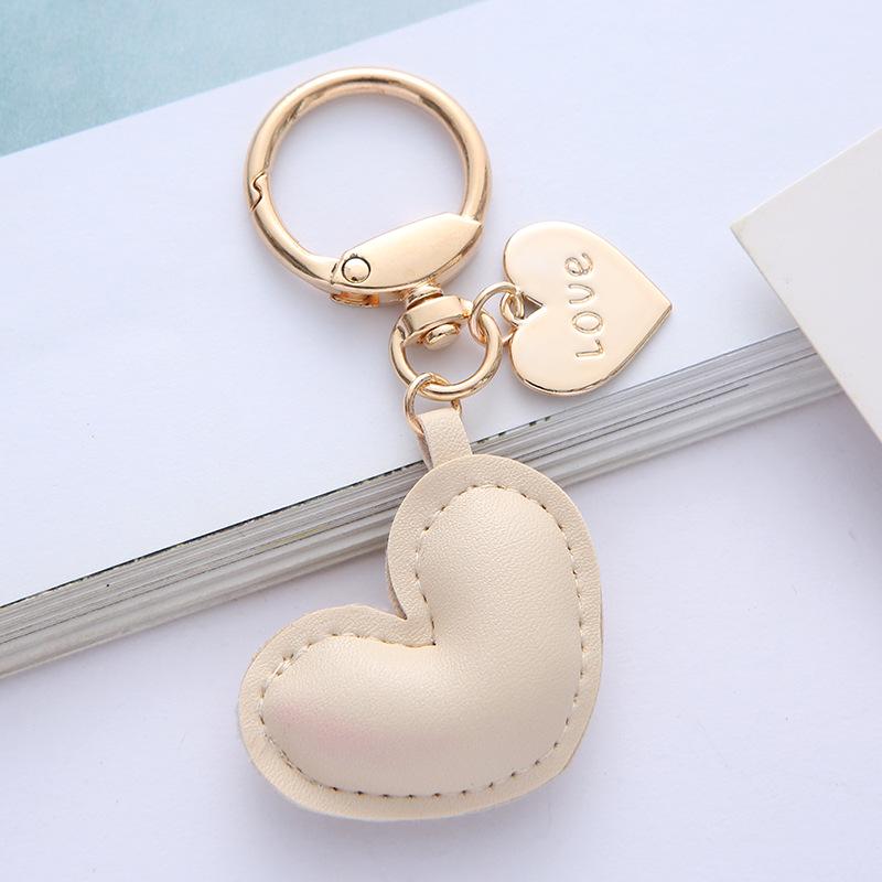 Neuer farbenfroher Leder-Herz-Schlüsselanhänger - Niedliches Legierungspendant-Accessoire
