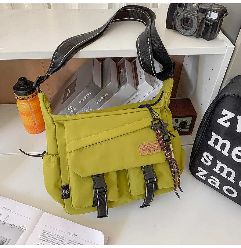 Schoolbag women's messenger bag tide brand ins tooling style Japanese casual men's bag large capacity shoulder bag personalized mailman bag tide