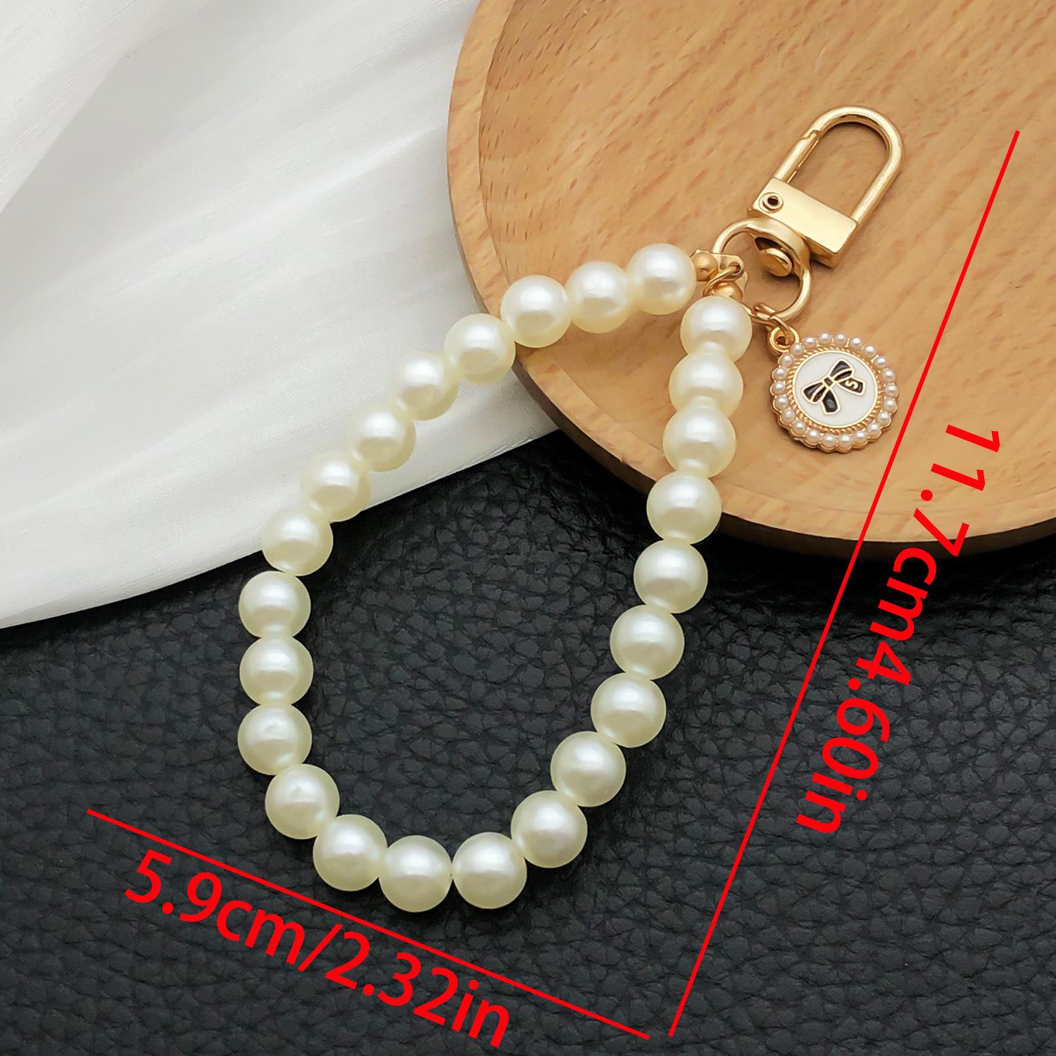 Creative Faux Pearl Bow Keychain Pendant - Unique Round Plate Design