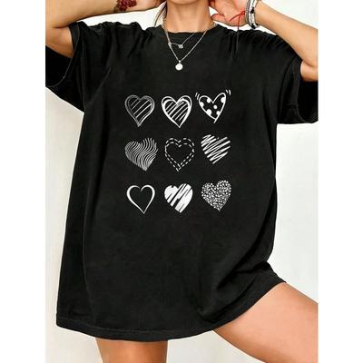 Schwarzes Oversized T-Shirt mit Herzmusterdruck für Freizeitkleidung und Alltagsstil