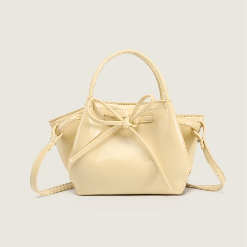 

Niche portable vegetable basket bag women s spring new fashion tote bag versatile bow messenger bag big светло-желтого