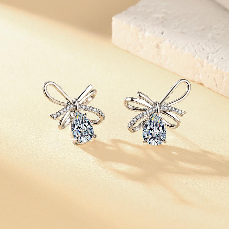 

2026 French Light Luxury Fashion Metal Three-dimensional Bow Water Drop Earrings Niche and Versatile Design Earrings