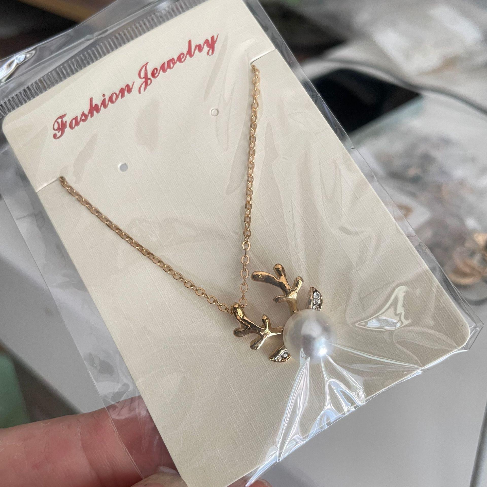 

Микро-павированное жемчужное ожерелье с рогами и серьги-пусеты - Рождественский ювелирный набор