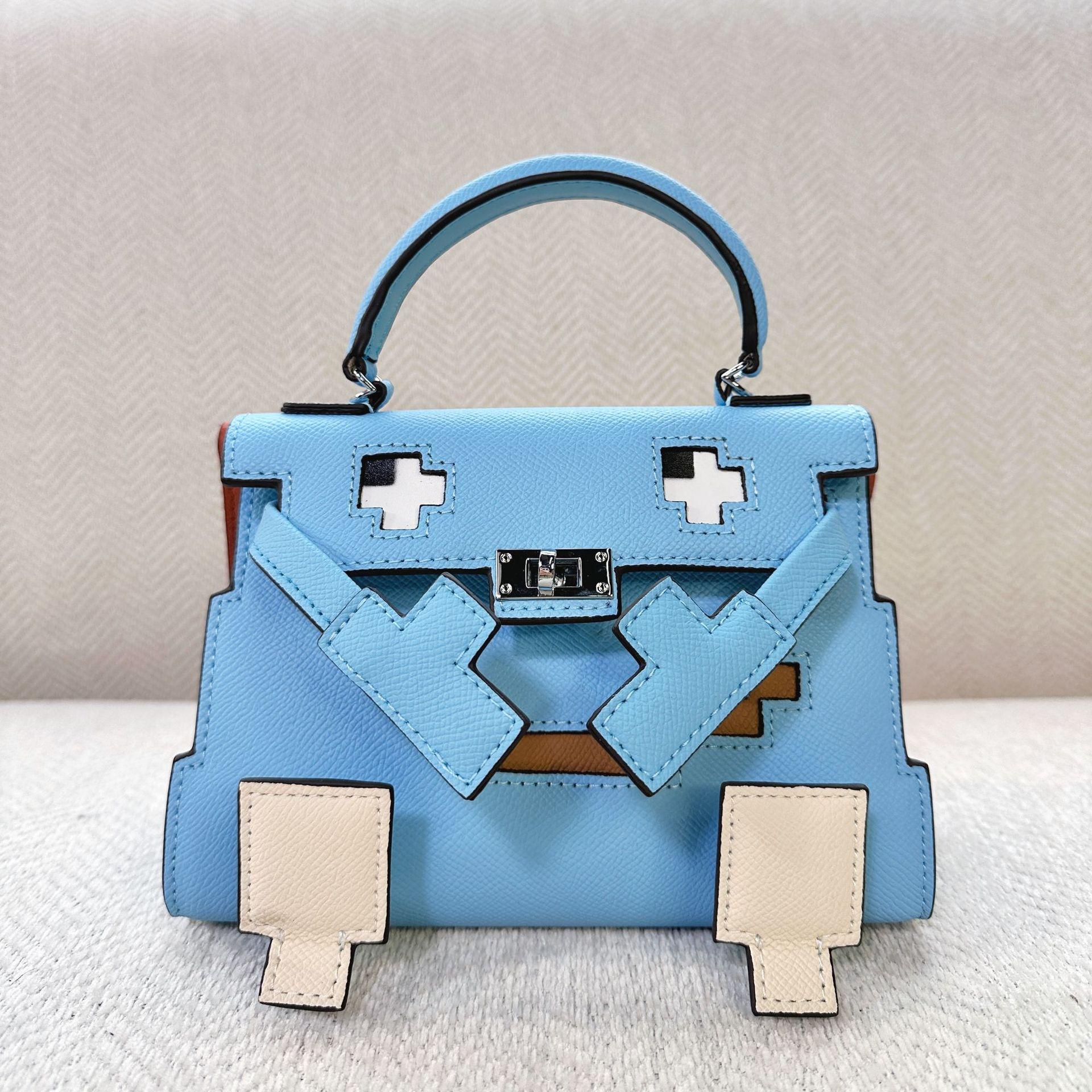 

2025 Новая сумка-кукла из натуральной кожи с мозаикой Маленькая сумка-монстр Модная и милая сумка через плечо для женщин 20x7x13cm