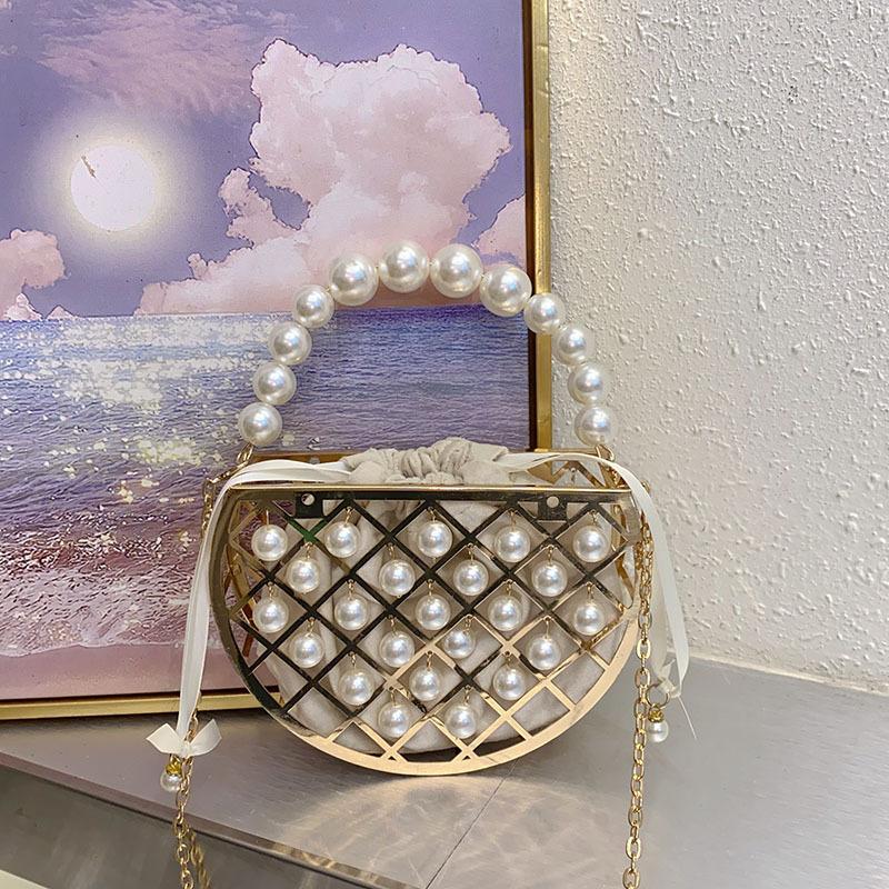

Stylish and simple beaded pearl bag dinner bag hollow semicircular handbag metal bucket bag