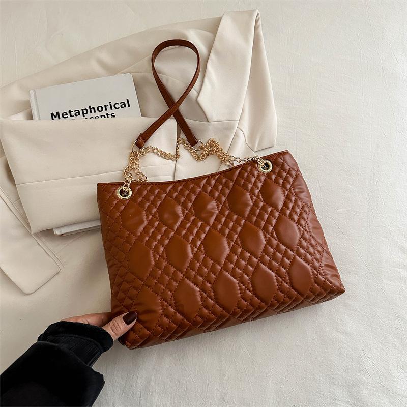 

2025 summer new casual one-shoulder armpit bag Korean version fashion small bag women s literary one-shoulder messenger chain bag коричневый