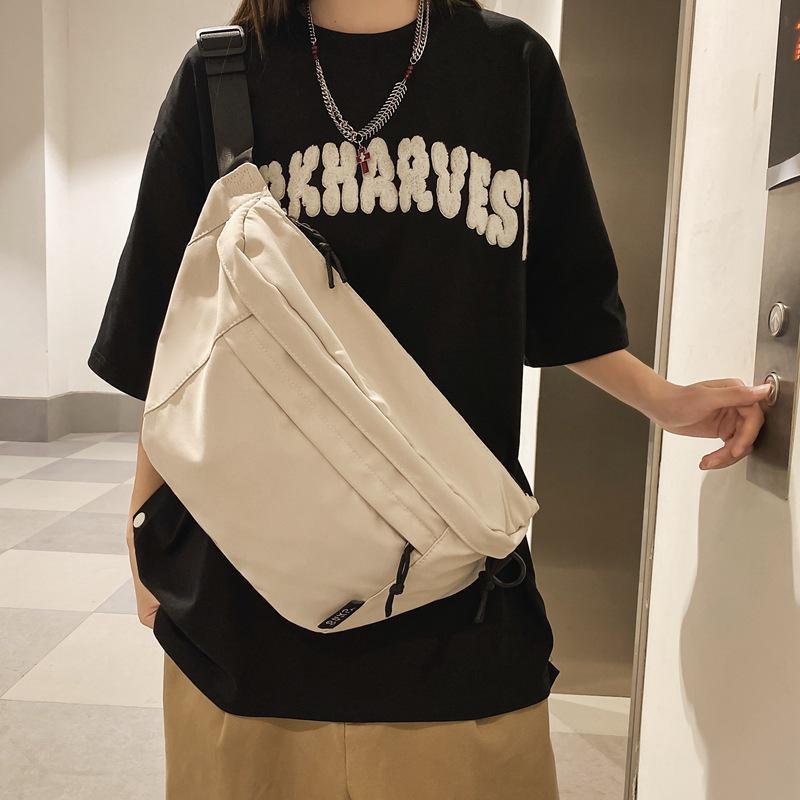 Large Capacity Unisex Chest & Crossbody Bag: Trendy Japanese Casual Style, Perfect for Workwear & Cycling.