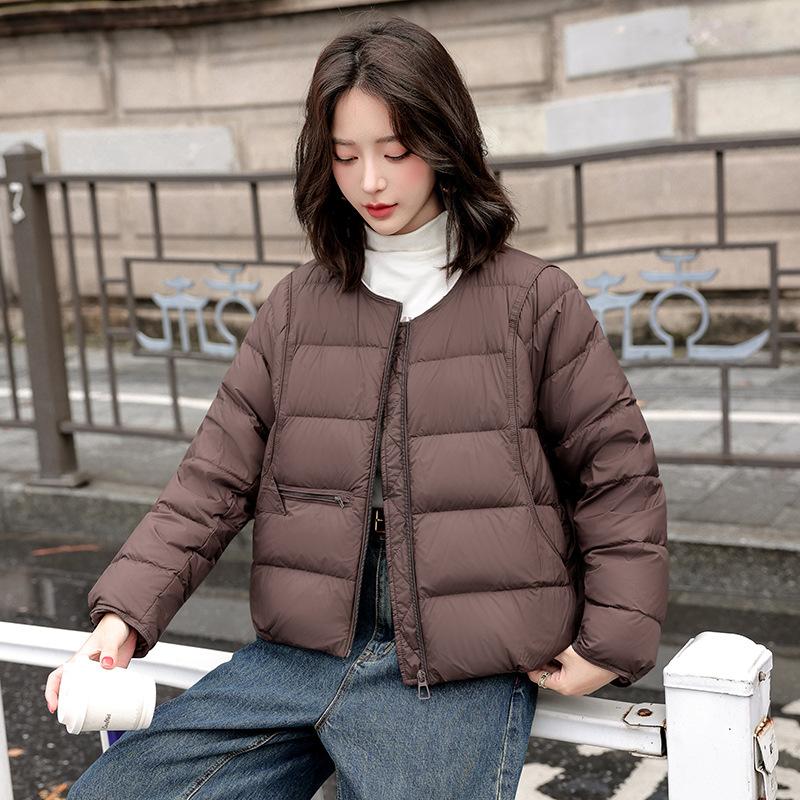 

Женская короткая теплая зимняя куртка с круглым вырезом L кофейный