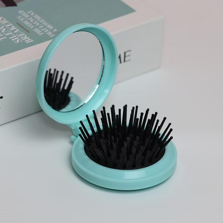

Compact Airbag Comb & Makeup Mirror with Cushion Head