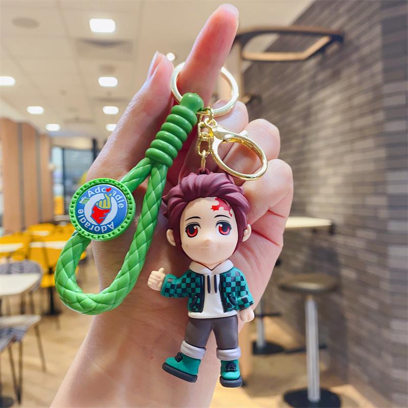 Cartoon Kreativer Geist Tötendes Schwert Dreidimensionale Figur Schlüsselanhänger Lustiger Schulranzen Anhänger Auto Schlüsselanhänger Geschenk