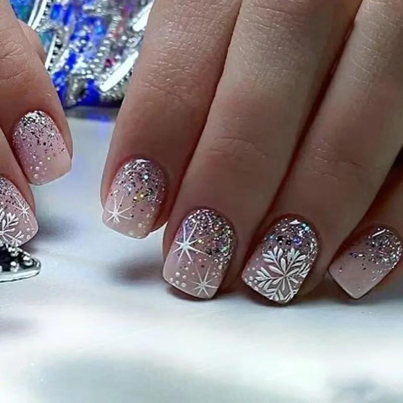 

BEPAN 24Pcs Winter Collection Press on Nails Silver Glitter Gradient with White Snowflake and Four-Pointed Star Perfect Gift for Girls