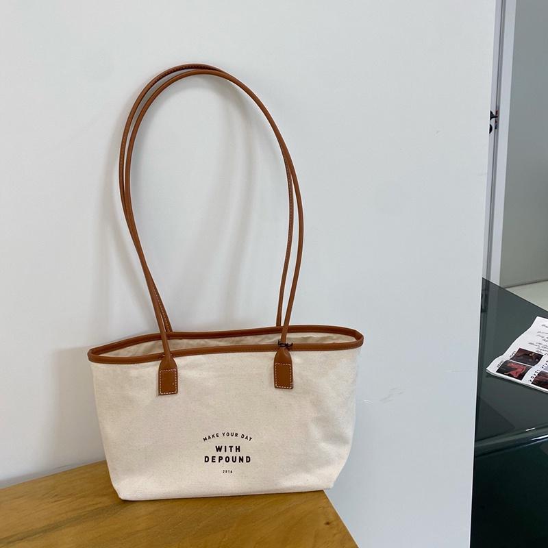 IELGY Korean retro stitching simple drawstring shoulder bag