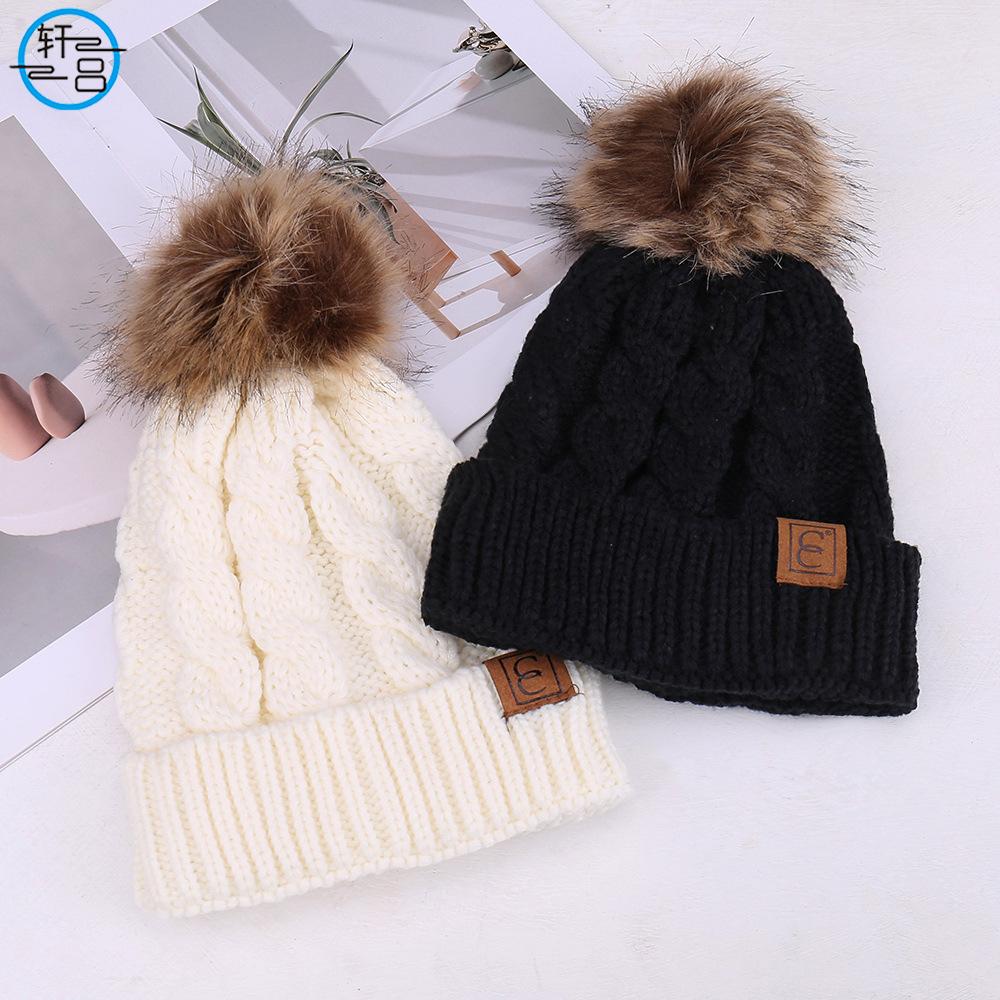 European and American fashion solid color simple warm comfortable knitted hat hairball decoration windproof face small wool hat