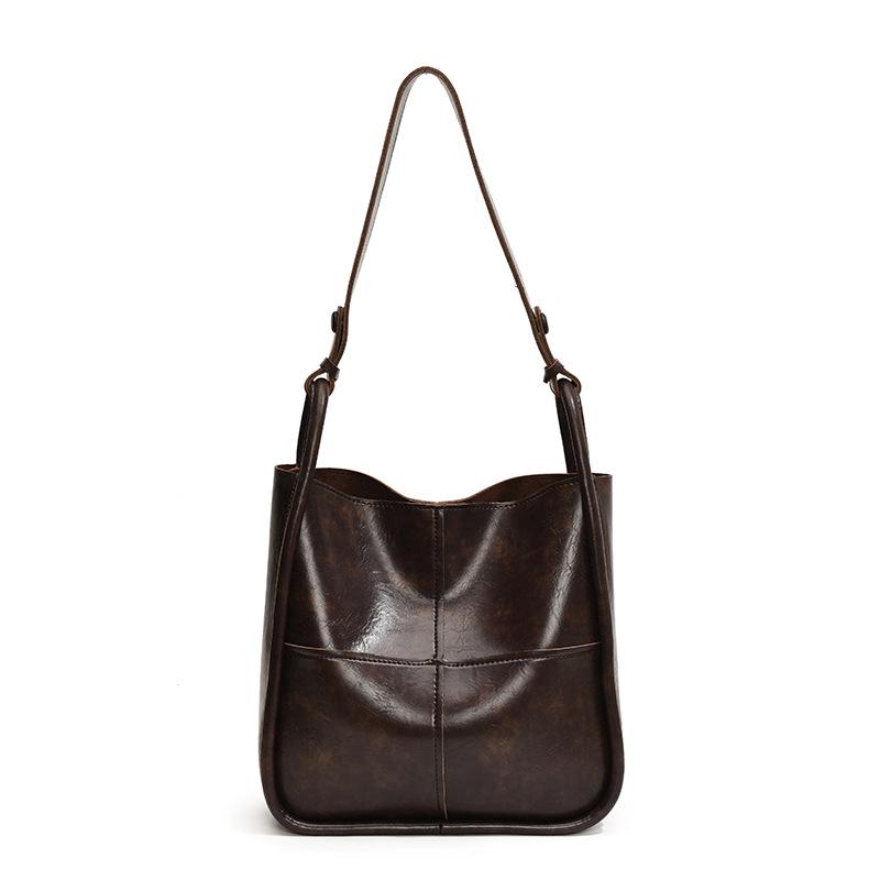 Tasche mit großem Fassungsvermögen, neue trendige Damentasche, Messenger-Bag mit Retro-Textur, modische und lässige einzelne Schulter-Achsel-Eimertasche.