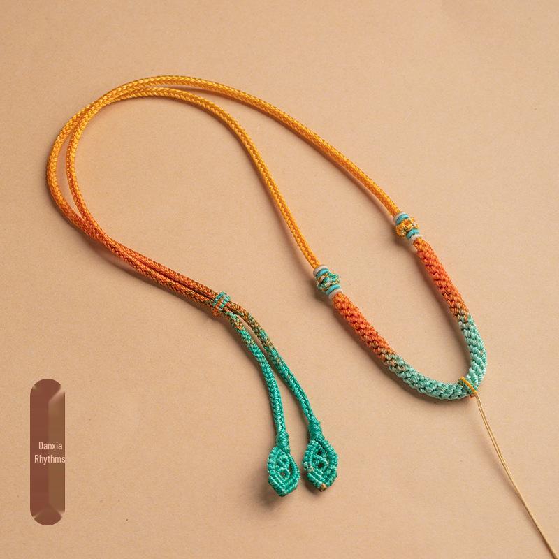 

Плетёное вручную восьмирядное ожерелье-подвеска с Буддой из жадеита и застёжкой-карабином