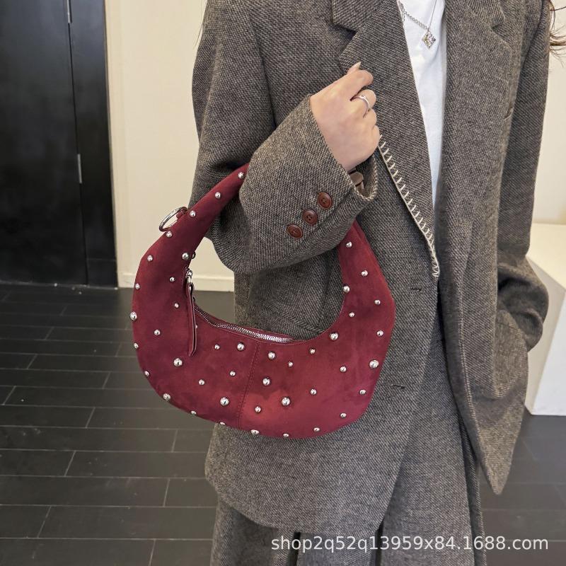 New niche underarm bag women's new fashionable versatile rivets half-moon single shoulder simple messenger women's bag