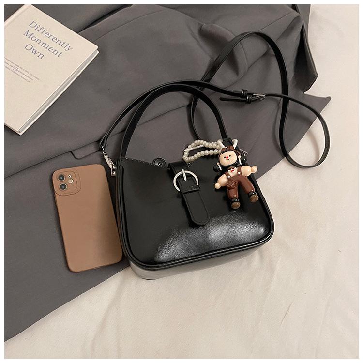 Simple and fashionable portable small square bag, new trend texture versatile solid color versatile mother and child bag women's bag