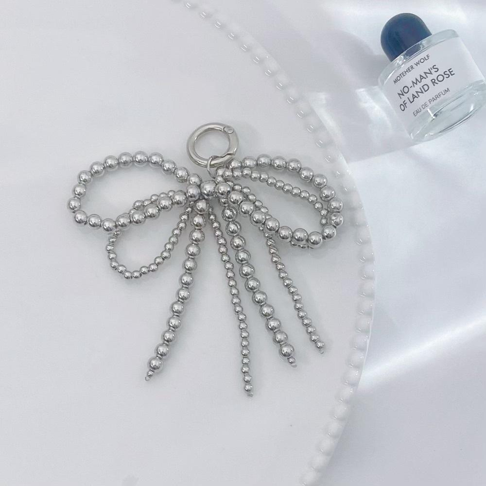 

INS Wind Mini Pearl Bow Fashion Anti-Lost Hand Carry Pendant Short Mobile Phone Chain срібний