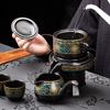 New Chinese lazy stone grinding semi-automatic tea set stone grinding ceramic retro gilt printing tea set small gift