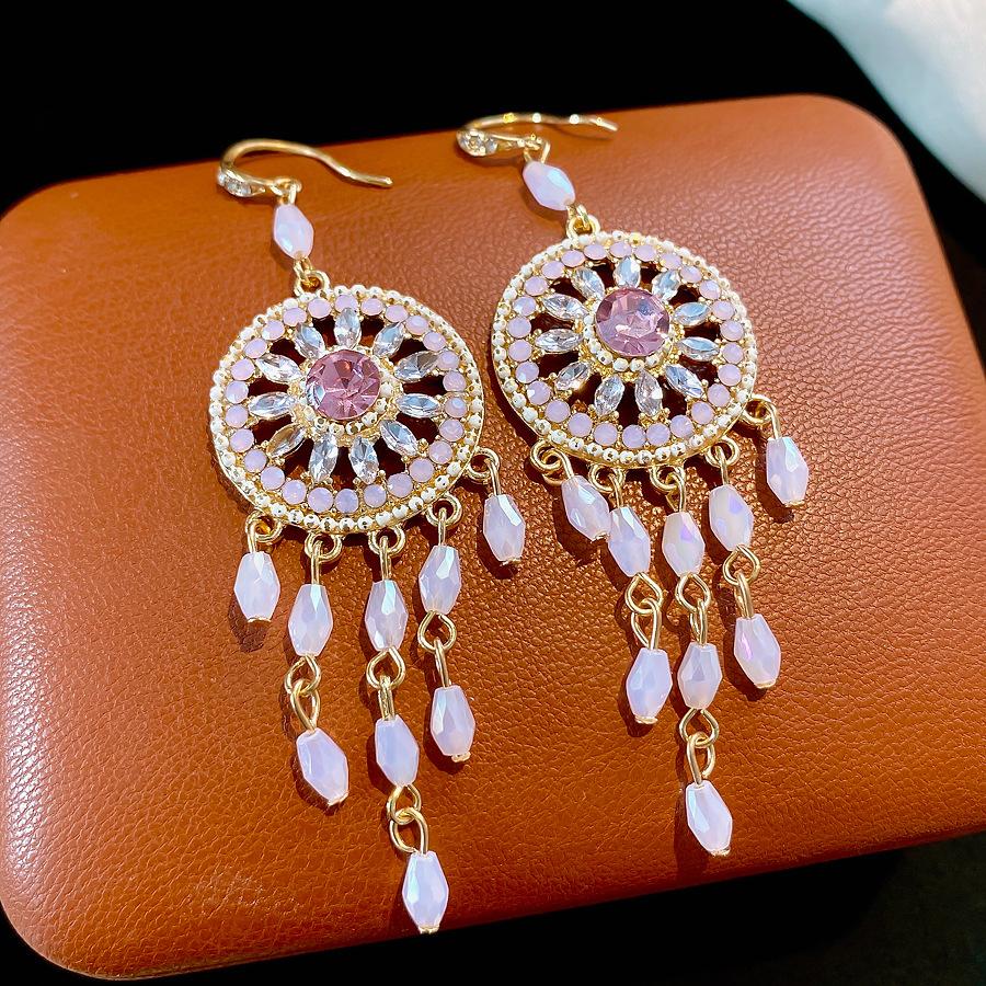 Bohemian ethnic style zircon round glass fringed earrings earrings, earrings, fashionable and exquisite earrings.